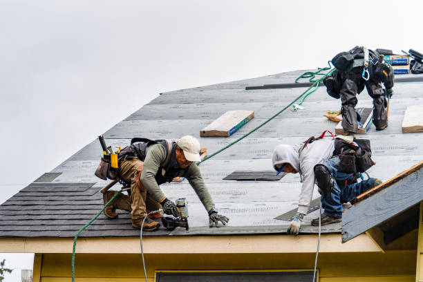Professional Roofing technician working in Washington, ME